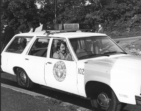 (29084) Carl Gentile Sits in Police Car During Strike (29084) Carl Gentile Sits in Police Car During Strike