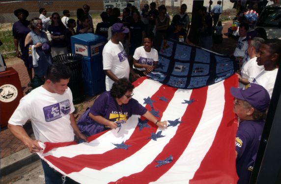 (29797) Participants Decorate Flag, Immigration Rights Rally, Washington, D.C., 2002 (29797) Participants Decorate Flag, Immigration Rights Rally, Washington, D.C., 2002