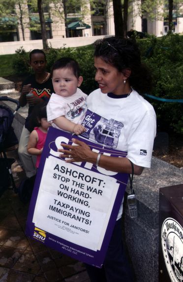 (29801) Demonstrator and Child, Immigration Rights Rally, Washington, D.C., 2002 (29801) Demonstrator and Child, Immigration Rights Rally, Washington, D.C., 2002