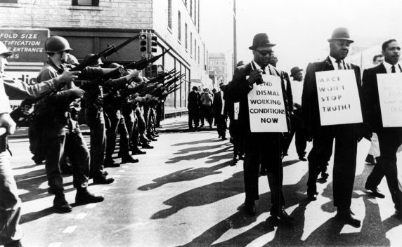 Note well the quiet dignity of these men, in suits no less, in the face of threatened and actual violence. Compare and contrast with the Madison Fiasco.